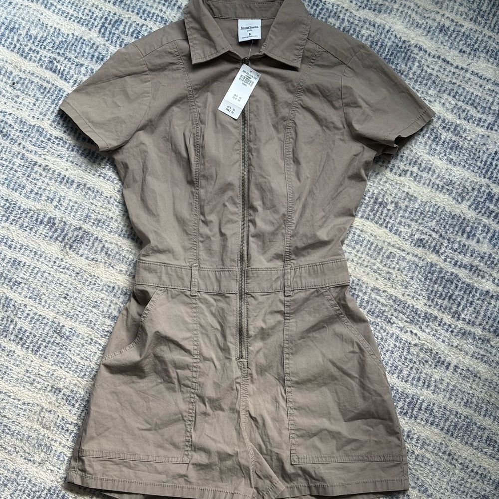 Adorable Tan Short Sleeve, Shorts Jumpsuit. Really cute! Brand new, with tags.